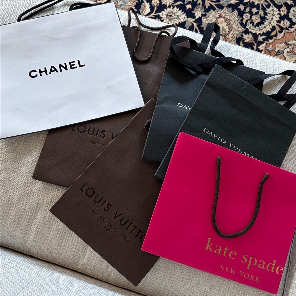 Chanel, Louis Vuitton, David Yurman, and Kate Spade Luxury Shopping Bags
